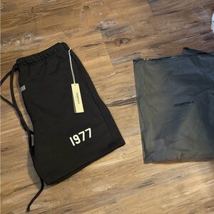 Essentials Charcoal shorts with 1977 Detail
